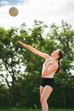 teen play volleyball in summer seasonの写真素材