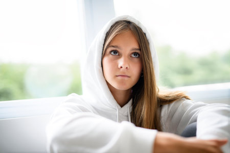 Teen girl wearing hoodiesの写真素材