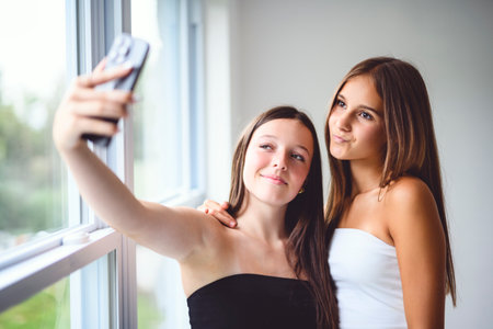 friends watching smartphone, the girlfriends having fun