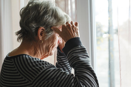 worried senior woman at home felling very badの写真素材