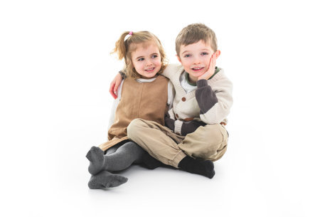 picture of boy and girl casual clothes posing emotions studio isolated backgroundの写真素材