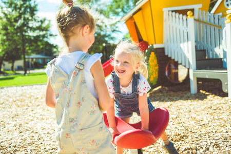 Happy kid having fun play together on summer seasonの写真素材