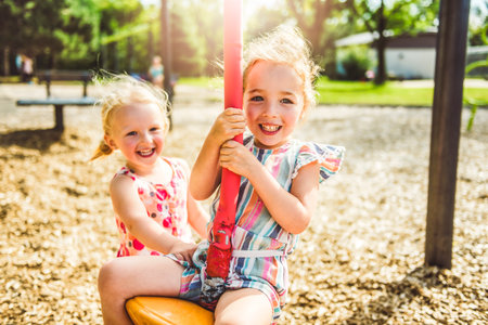 Happy kid having fun play together on summer seasonの写真素材