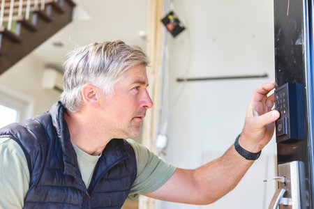 Electrician worker installation electric code inside apartment. Construction decoration concept.の写真素材