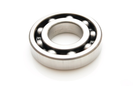 Ball bearing from a car gearbox isolated on white background の写真素材