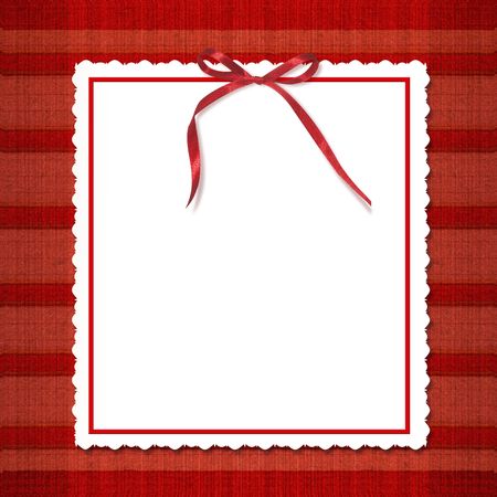 Framework for invitations. A red bow. A beautiful tartan background.の写真素材