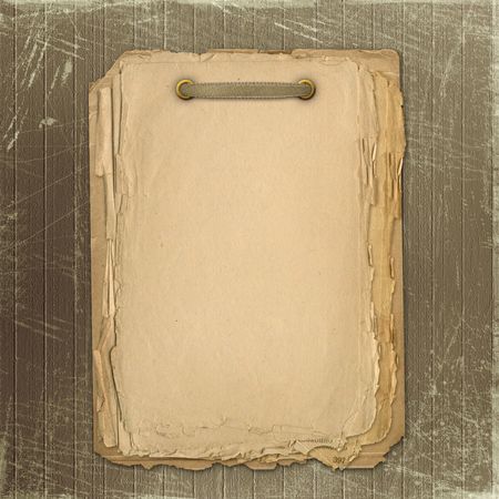 Grunge copybook for information in scrapbooking style with ribbonの写真素材