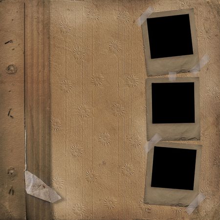 Old photoframes are hanging on the abstract backgroundの写真素材