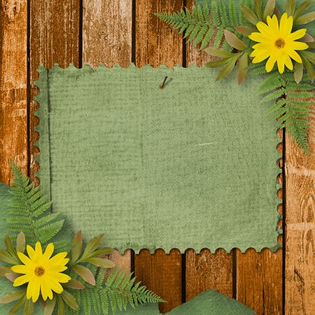Grunge paper with bunch of flower on the wooden backgroundの写真素材