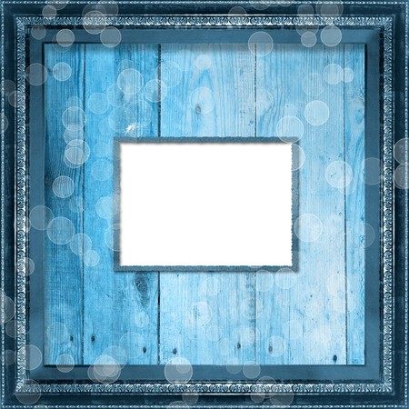 Grunge frame in the Victorian style on the wooden background