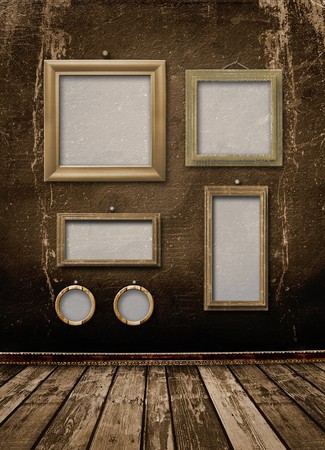 Old gold frames Victorian style on the wall in the roomの写真素材