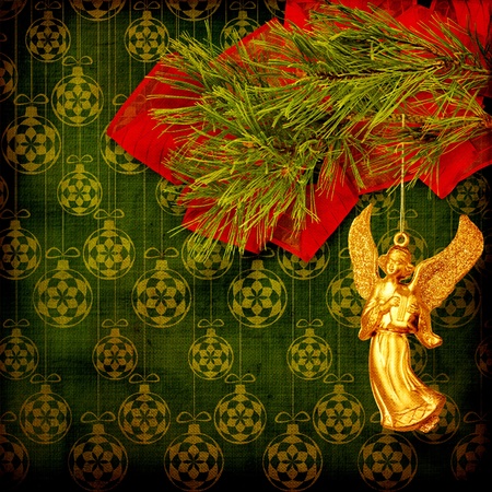 Angel christmas hanging on the pine branch. の写真素材