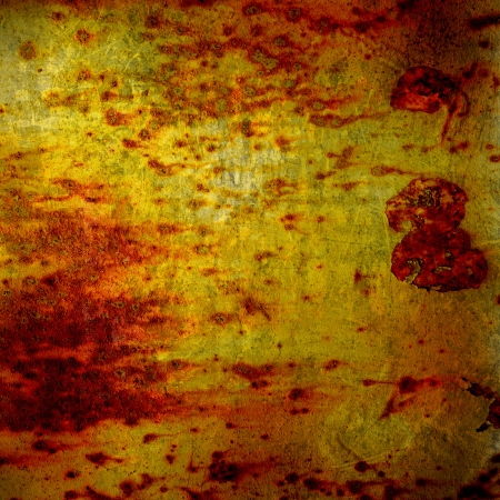 A cracked rusty metal wall. Background for design の写真素材