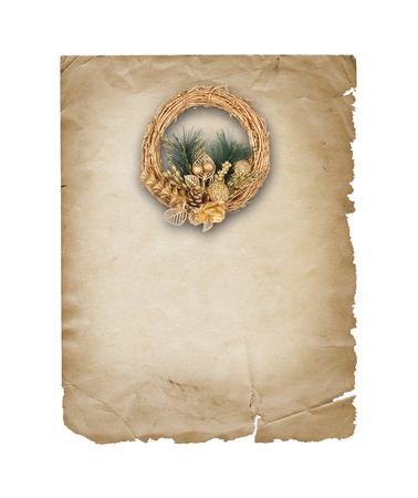 Christmas golden wreath with coniferous branch on the white isolated backgroundの写真素材