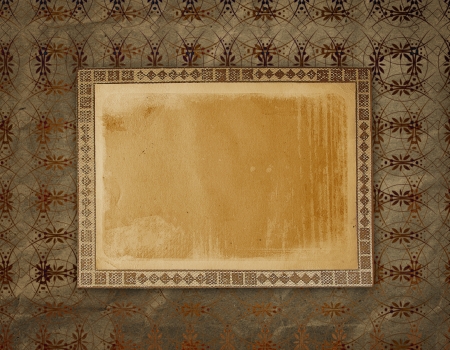 Old grunge frames on the ancient paper background の写真素材
