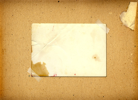 Old grunge frames on the ancient paper background 