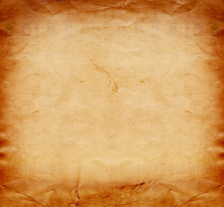 Old grunge crumpled cardboard sheet of paper for designの写真素材