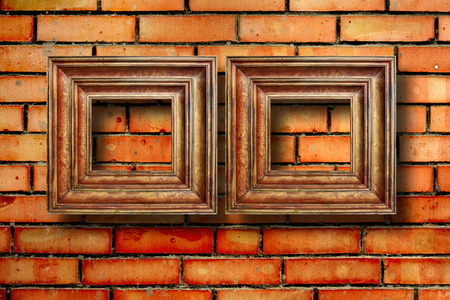 Vintage wooden frames for pictures on old brick wallの写真素材