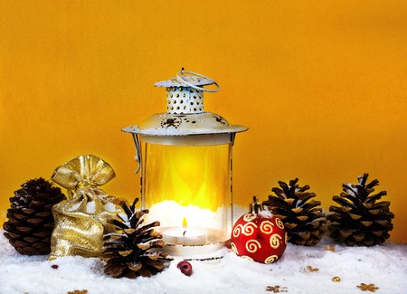 Christmas bag with gifts, Christmas decorations and old lanternの写真素材