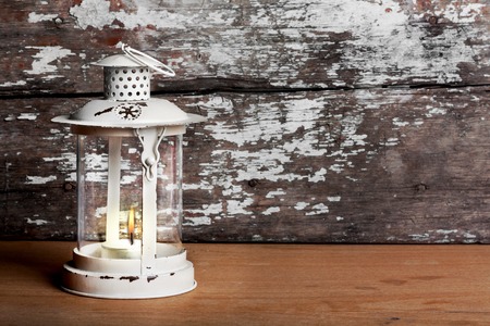 Old Christmas lantern on background of  old brick wall and floorの写真素材