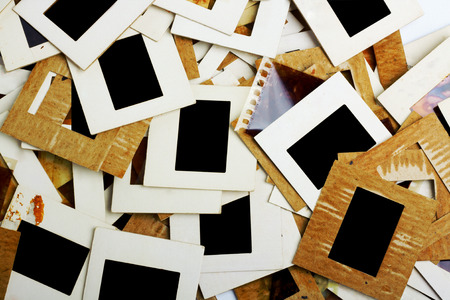 Set of old slides photos and film on the tableの写真素材