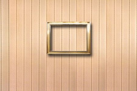 Gilded wooden frames for pictures on striped backgroundの写真素材