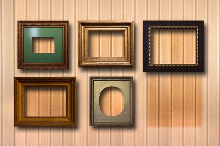 Gilded wooden frames for pictures on striped backgroundの写真素材