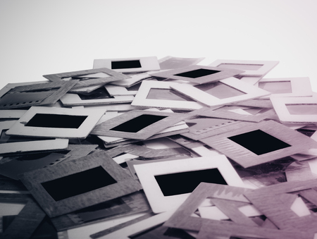 Set of vintage old slides, photos and film on the tableの写真素材