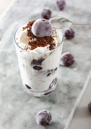 Ice cream with cherry berries on  beautiful marble countertop backgroundの写真素材