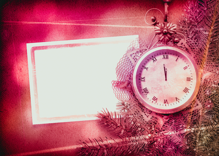Antique clock face with lace and firtree on the abstract background