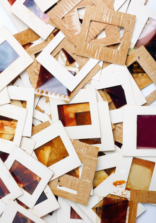 Set of vintage old slides, photos and film on the table