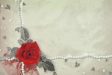 Old vintOld vintage card with  beautiful red rose, lace and pearlsの写真素材