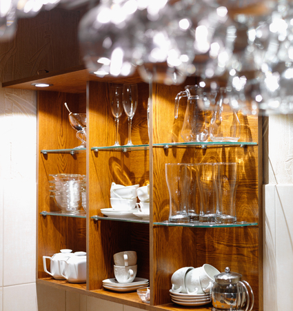 Empty  glasses hanging above the bar in the restaurant. Night lifeの写真素材
