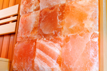 Interior dry Himalayan salt sauna wall.   Sauna room at the spa hotelの写真素材