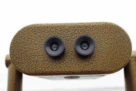 Public binocular telescope on the observation deck overlooking the sea. Binoscope closeup,...