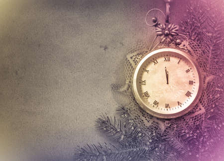 Antique clock face with lace and firtree on the abstract backgroundの写真素材