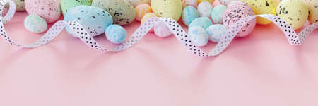 Beautiful Easter card with colorful eggs and ribbon on paper pink background. Flat lay, top view, copy space concept.の写真素材
