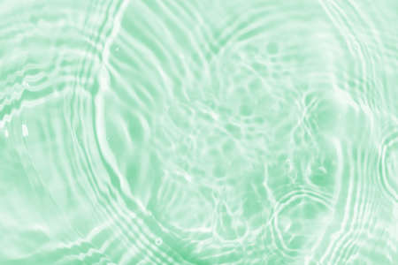 Water panoramic banner background. water texture; water surface with rings and ripple. Spa concept background. flat lay; top view; copyspace; composition with copy-space.の写真素材