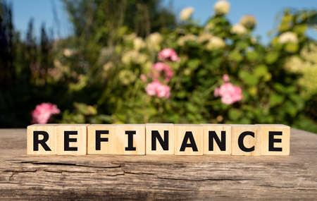 focus on wooden blocks with letters Refinance text. Concept imageの写真素材