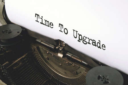 Time To Upgrade typed words on a vintage typewriter.の写真素材