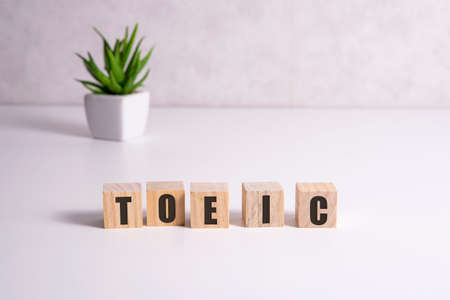 Toeic word on wooden cubes. Toeic conceptの写真素材