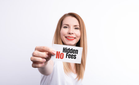 A businesswoman holding a business card with the words, No Hidden Fees, written on it.