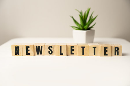 'Newsletter' written on wood blocks. Business concept. Copy space. Beautiful white backgroundの写真素材