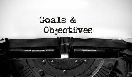 Goals and Objectives words written on a vintage typewriter.の写真素材
