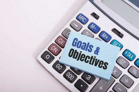 Goals and Objectives words written on cardの写真素材
