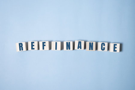 focus on wooden blocks with letters Refinance text. Concept image.の写真素材
