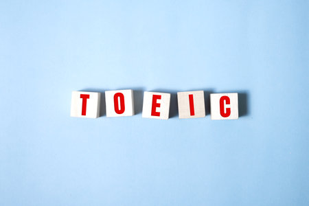 Toeic word on wooden cubes. Toeic conceptsの素材