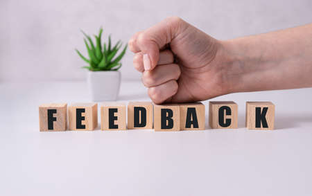FEEDBACK word made with building blocks on white.の写真素材