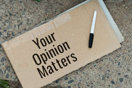 The words Your Opinion Matters on a note cardの写真素材