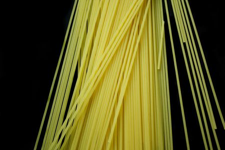 Spagetti textured on the black backgroundの写真素材